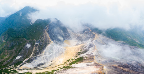 Aerial view Sibayak volcano, active caldera steaming, travel destination in Berastagi, Sumatra, Indonesia.