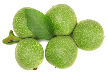 Green walnuts isolated on white, top view