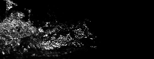 Blurry images of drinking water liquid wave or carbonate drink or oil shape or soda splashing and floating drop in black background for represent sparkling refreshment and refreshing