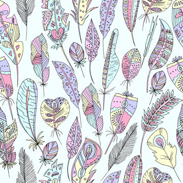 Vector illustration of a seamless multicolored pattern of feathers of birds of different shapes. Drawing made by hands of different colors.