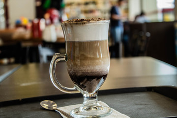 cup of coffee on wooden table
