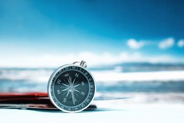 Time to Travel. Idea for tourism with passport, tickets and compass on the background of the sea....