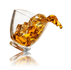 splash of whiskey in glass