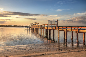 Isle of Capri Fire Department dock for Boat 90 at sunset near Marco Island, Florida