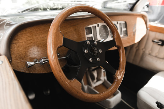 Luxury elegan wedding retro car. Vintage wedding car. Classic italian car. Retro car, vintage steering wheel clock, wooden,