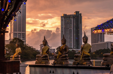 Buddha statues on the Beira Lake in Colombo.