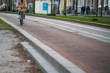 A woman ride a bicycle