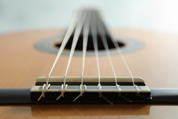 Beautiful six - string classic guitar on white background, closeup - obrazy, fototapety, plakaty