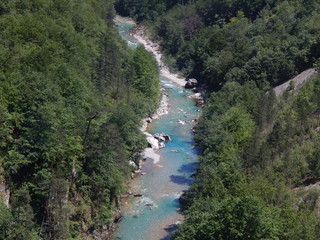 Fototapeta na wymiar River in the mountain forest