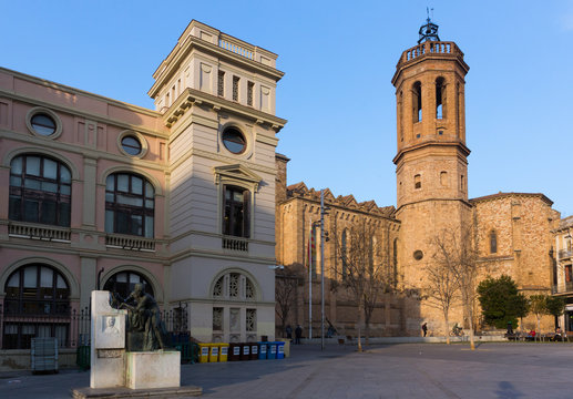 Square in Sabadell with statue and church