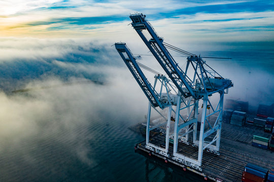 Port Freight Cranes with Fog Aerial Photo From Drone Long Beach