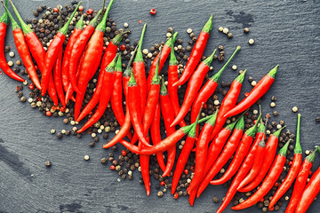 Hot red pepper. Chilean pepper on a black.