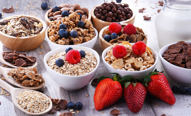 Bowls with different sorts of breakfast cereal products