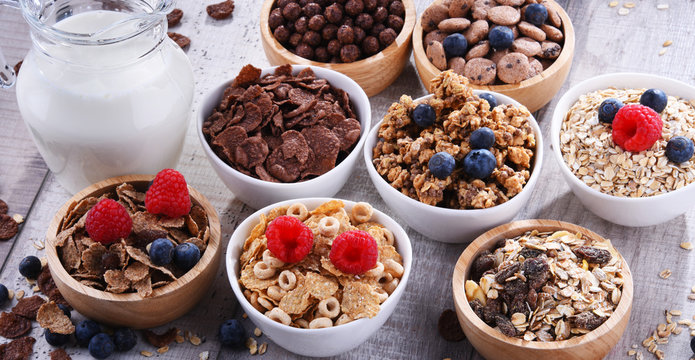 Bowls with different sorts of breakfast cereal products