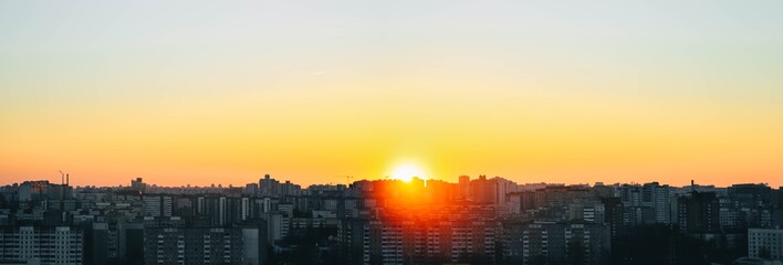 panorama of sunset in the city, sleeping area, high-rise buildings of the 2000s