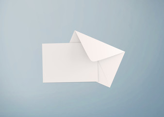White postcard and envelope on background, top view. Blank envelope mockup and letterhead presentation template. Postcard flyer for your design.
