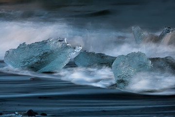 Death of iceberg (Jokulsarlon Glacier Lagoon, Iceland)