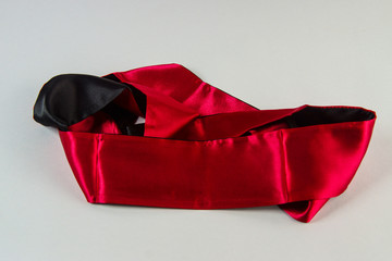 red blindfold love romance on a white background