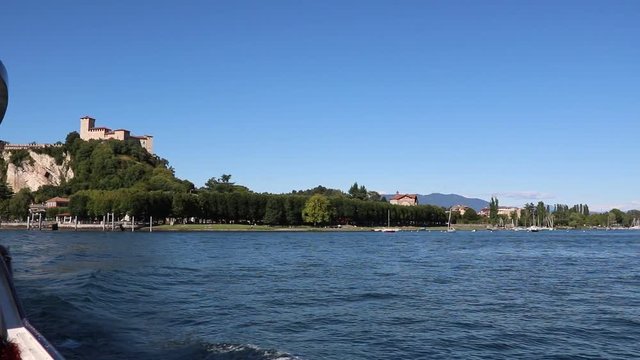 View to Castle Rocca d'Angera in Angera at Lake Maggiore, Italy