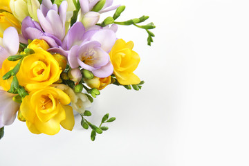 Bouquet of fresh freesia flowers isolated on white, top view