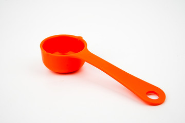 1/8 cup equals to 30 ml measuring cup isolated on white background