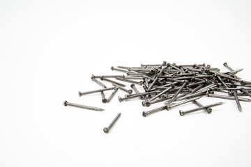 Bunch of metal nails on white background