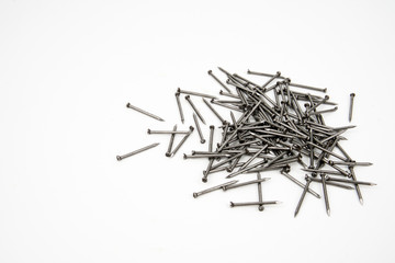 Bunch of metal nails on white background