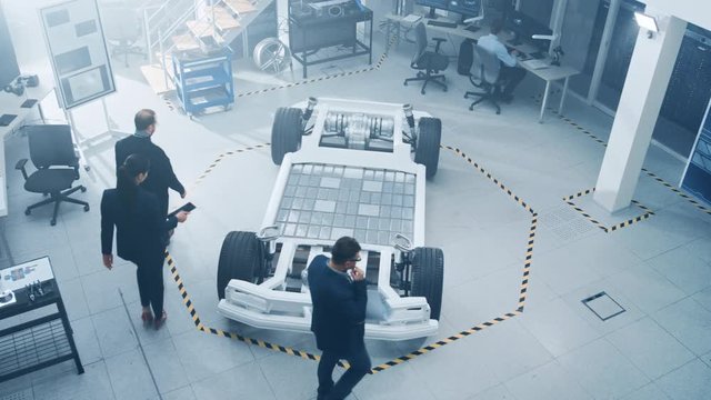 Team of Automobile Design Engineers Enter Automotive Innovation Facility