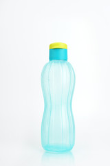 Blue plastic water bottle on a white background
