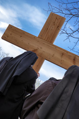 Nuns with cross at calvary
