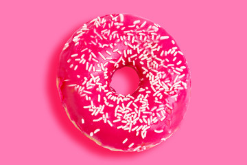 pink donut on a pink background. Creative trend food concept
