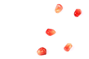 pomegranate grains isolated on white background