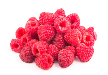 Raspberry with leaves isolated on white background