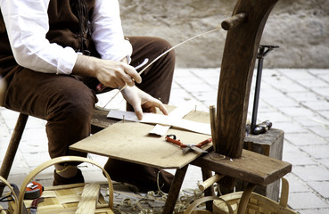 Craftsman making baskets