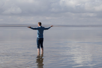 the salt lake from Aksaray , Ankara - Turkey. The people reflection is on the lake.