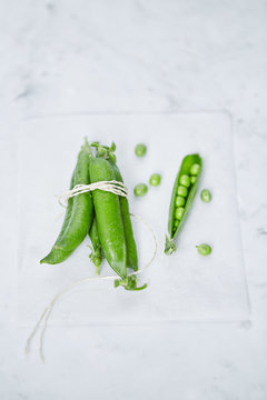 Peas on light background