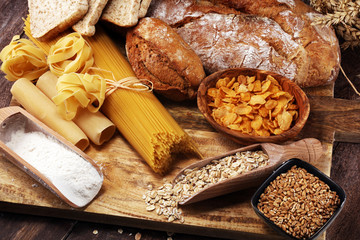 whole grain products with complex carbohydrates on table - obrazy, fototapety, plakaty