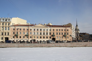 houses on Fontanka embankment in winter in St. Petersburg, Russia