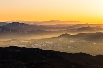 Carpathians mountains range covered by sunrise sun