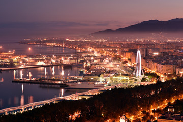 Fototapeta na wymiar Aerial view of Plaza Marina with ferris wheel, port of Malaga, sunset, Andalusia, Spain