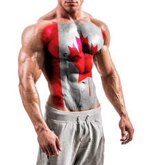 Torso of shirtless muscular man with Canada flag painted on naked chest, isolated on white in...