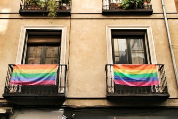 Facade with gay pride flag in Madrid