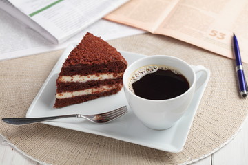 Breakfast with chocolate cake and coffee