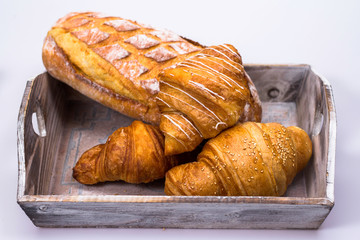 fresh croissants on a plate