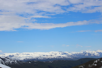 Naklejka premium Spring mountains and sky