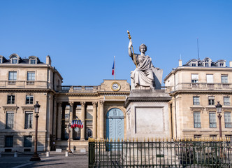Obraz premium Paris, France: Rear entrance of French National Assembly (Palais Bourbon) with Law statue in foreground. The statue is from Jean-Jacques Feuchere (1807-1852).