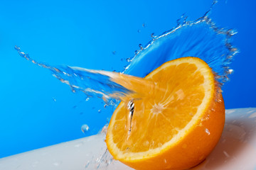 orange in the splash water