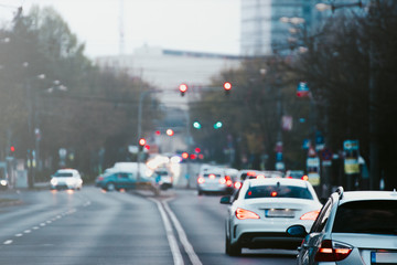 Beautiful sunset city.cars go on the street