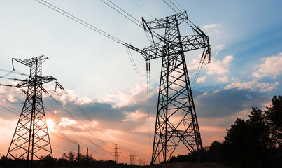 High-voltage power lines. Electricity distribution station. high voltage electric transmission tower. Distribution electric substation with power lines and transformers