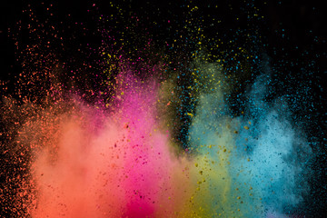 Fototapeta na wymiar Colored powder explosion on black background.